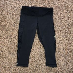 Lululemon black cropped reflective leggings.